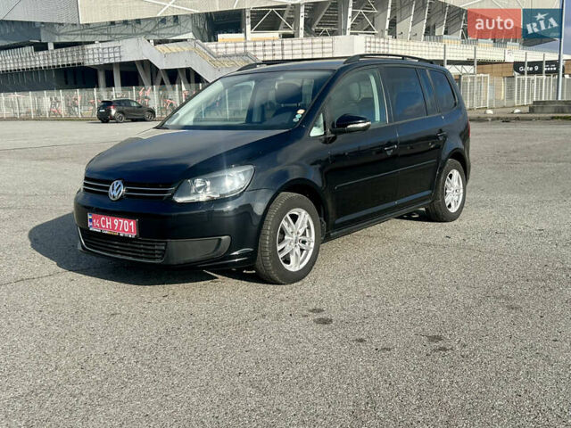 Черный Фольксваген Туран, объемом двигателя 1.6 л и пробегом 223 тыс. км за 11700 $, фото 1 на Automoto.ua