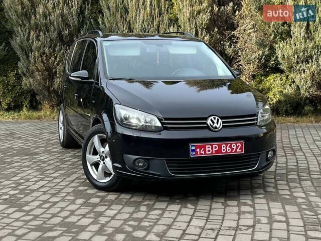 Чорний Фольксваген Туран, об'ємом двигуна 2 л та пробігом 199 тис. км за 13650 $, фото 1 на Automoto.ua
