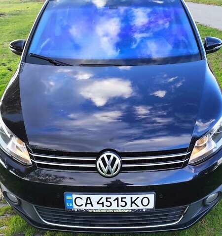 Черный Фольксваген Туран, объемом двигателя 1.97 л и пробегом 349 тыс. км за 13300 $, фото 1 на Automoto.ua