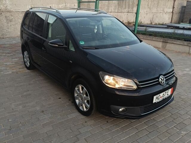 Черный Фольксваген Туран, объемом двигателя 0 л и пробегом 211 тыс. км за 12800 $, фото 1 на Automoto.ua