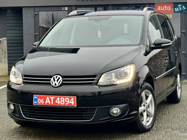 Черный Фольксваген Туран, объемом двигателя 2 л и пробегом 196 тыс. км за 14599 $, фото 1 на Automoto.ua