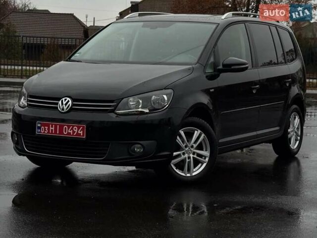 Чорний Фольксваген Туран, об'ємом двигуна 2 л та пробігом 223 тис. км за 13400 $, фото 1 на Automoto.ua