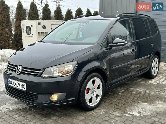 Черный Фольксваген Туран, объемом двигателя 1.6 л и пробегом 210 тыс. км за 10400 $, фото 1 на Automoto.ua