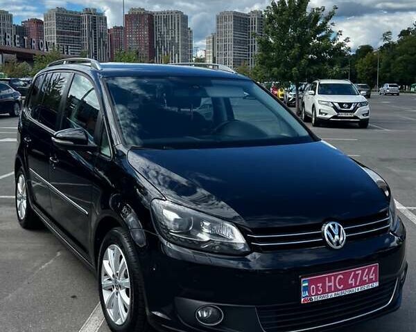 Чорний Фольксваген Туран, об'ємом двигуна 1.4 л та пробігом 237 тис. км за 9900 $, фото 1 на Automoto.ua