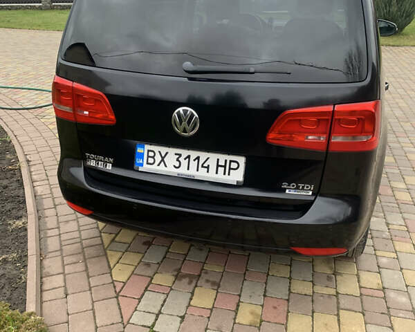 Черный Фольксваген Туран, объемом двигателя 1.97 л и пробегом 281 тыс. км за 13500 $, фото 1 на Automoto.ua