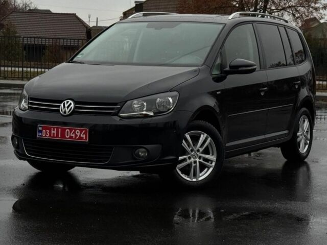 Черный Фольксваген Туран, объемом двигателя 2 л и пробегом 223 тыс. км за 13400 $, фото 1 на Automoto.ua
