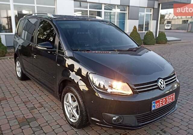 Черный Фольксваген Туран, объемом двигателя 1.6 л и пробегом 165 тыс. км за 13250 $, фото 1 на Automoto.ua