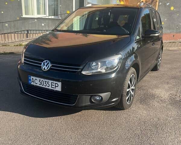 Черный Фольксваген Туран, объемом двигателя 1.6 л и пробегом 295 тыс. км за 12100 $, фото 1 на Automoto.ua