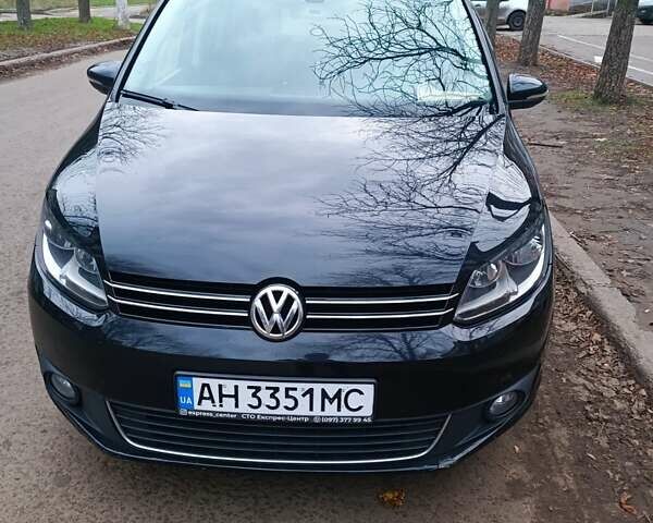 Черный Фольксваген Туран, объемом двигателя 1.6 л и пробегом 293 тыс. км за 10500 $, фото 1 на Automoto.ua