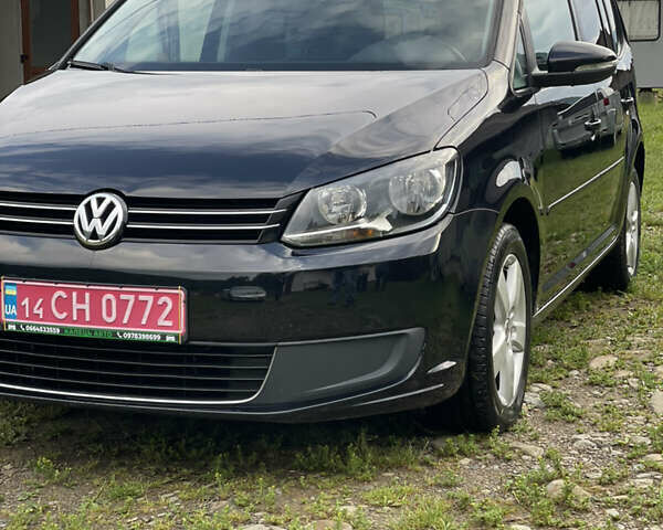 Чорний Фольксваген Туран, об'ємом двигуна 1.6 л та пробігом 253 тис. км за 12700 $, фото 1 на Automoto.ua