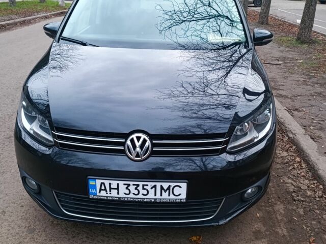 Черный Фольксваген Туран, объемом двигателя 1.6 л и пробегом 293 тыс. км за 10500 $, фото 1 на Automoto.ua