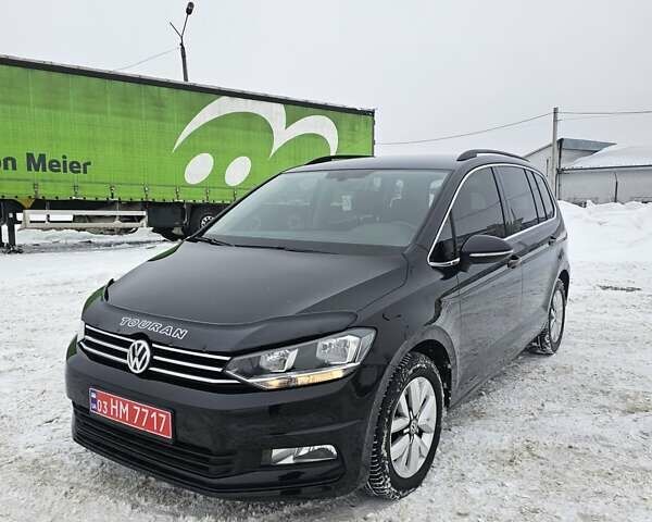 Черный Фольксваген Туран, объемом двигателя 1.6 л и пробегом 183 тыс. км за 15700 $, фото 1 на Automoto.ua