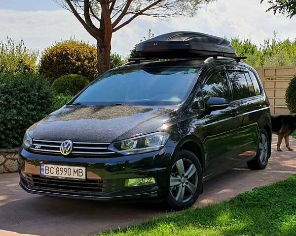 Чорний Фольксваген Туран, об'ємом двигуна 1.97 л та пробігом 240 тис. км за 14700 $, фото 1 на Automoto.ua