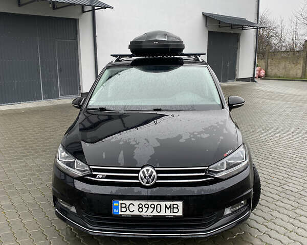 Черный Фольксваген Туран, объемом двигателя 1.97 л и пробегом 242 тыс. км за 14200 $, фото 1 на Automoto.ua