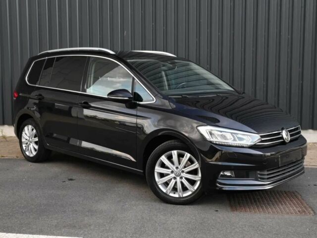 Черный Фольксваген Туран, объемом двигателя 1.8 л и пробегом 53 тыс. км за 16000 $, фото 1 на Automoto.ua