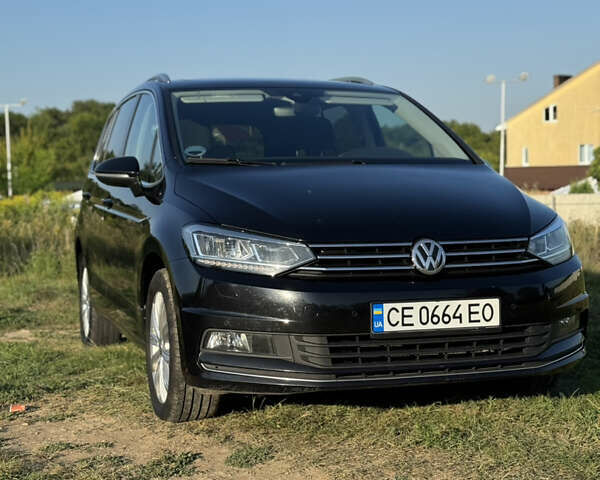 Черный Фольксваген Туран, объемом двигателя 1.97 л и пробегом 268 тыс. км за 19500 $, фото 1 на Automoto.ua