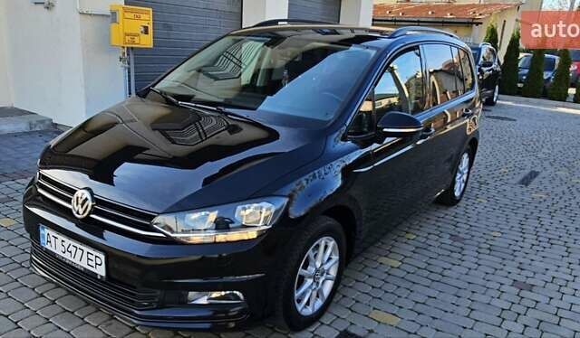 Черный Фольксваген Туран, объемом двигателя 1.6 л и пробегом 197 тыс. км за 14650 $, фото 1 на Automoto.ua