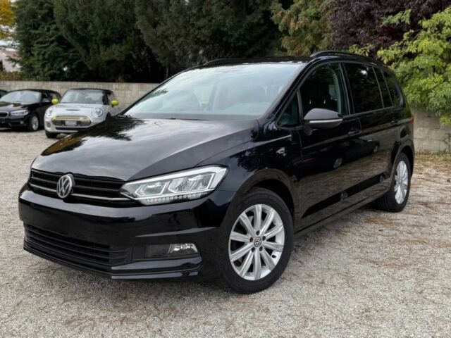 Черный Фольксваген Туран, объемом двигателя 2 л и пробегом 44 тыс. км за 7500 $, фото 1 на Automoto.ua