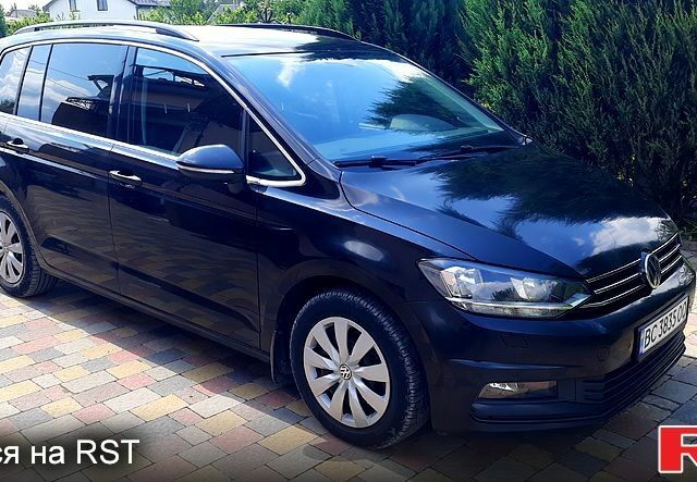 Черный Фольксваген Туран, объемом двигателя 2 л и пробегом 284 тыс. км за 17500 $, фото 1 на Automoto.ua