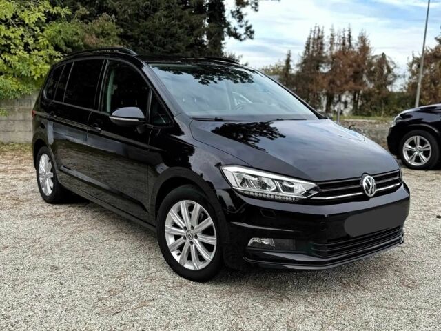 Чорний Фольксваген Туран, об'ємом двигуна 2 л та пробігом 44 тис. км за 12000 $, фото 1 на Automoto.ua