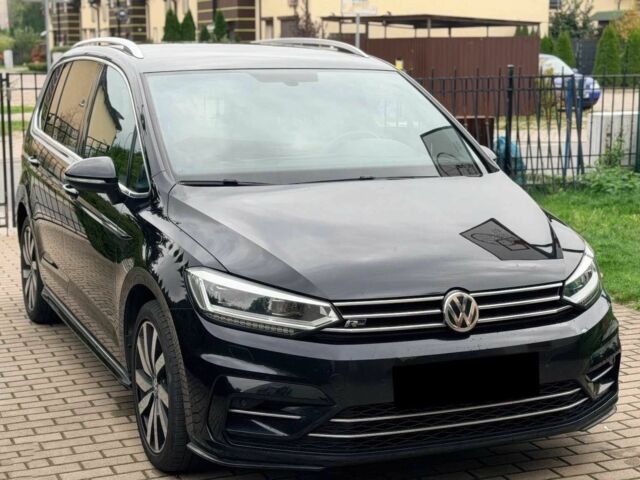 Черный Фольксваген Туран, объемом двигателя 0 л и пробегом 87 тыс. км за 12000 $, фото 1 на Automoto.ua