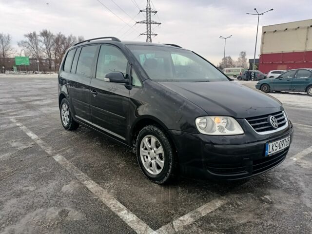 Черный Фольксваген Туран, объемом двигателя 1.9 л и пробегом 340 тыс. км за 3150 $, фото 1 на Automoto.ua