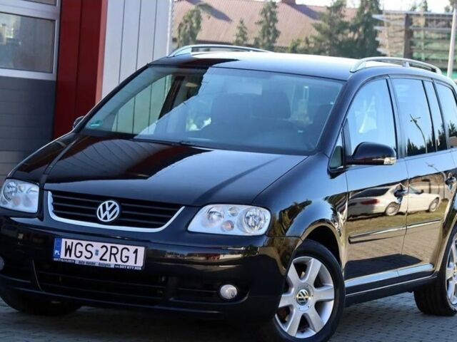 Черный Фольксваген Туран, объемом двигателя 1.9 л и пробегом 266 тыс. км за 2650 $, фото 1 на Automoto.ua