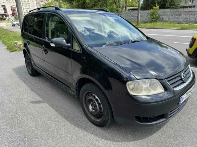 Черный Фольксваген Туран, объемом двигателя 0 л и пробегом 495 тыс. км за 3903 $, фото 1 на Automoto.ua