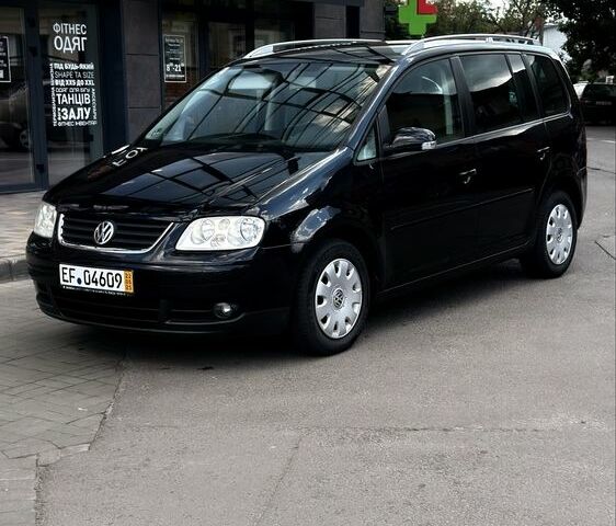 Чорний Фольксваген Туран, об'ємом двигуна 1.6 л та пробігом 190 тис. км за 5700 $, фото 1 на Automoto.ua