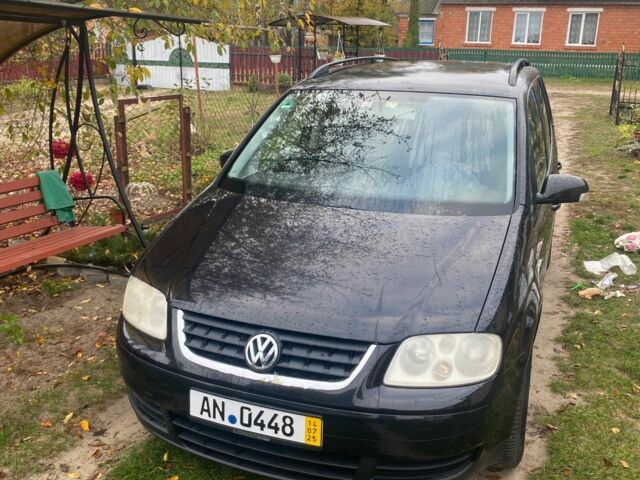Черный Фольксваген Туран, объемом двигателя 1.9 л и пробегом 270 тыс. км за 2450 $, фото 1 на Automoto.ua
