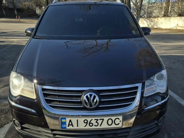 Чорний Фольксваген Туран, об'ємом двигуна 1.4 л та пробігом 250 тис. км за 7500 $, фото 1 на Automoto.ua