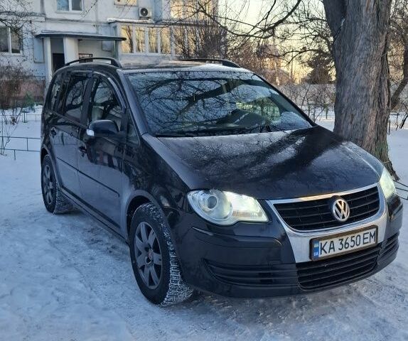 Черный Фольксваген Туран, объемом двигателя 2 л и пробегом 3 тыс. км за 5000 $, фото 1 на Automoto.ua