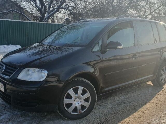 Чорний Фольксваген Туран, об'ємом двигуна 1.9 л та пробігом 333 тис. км за 3200 $, фото 1 на Automoto.ua