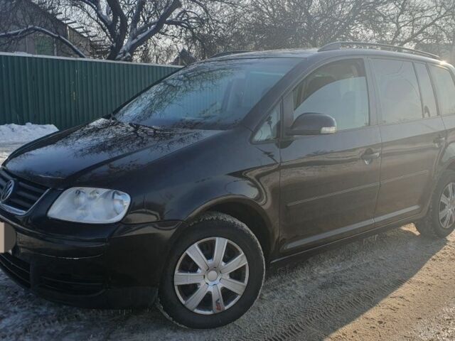 Чорний Фольксваген Туран, об'ємом двигуна 1.9 л та пробігом 333 тис. км за 3200 $, фото 1 на Automoto.ua