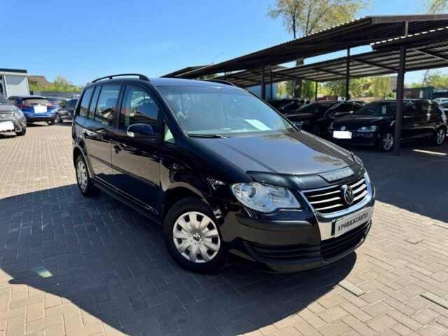 Черный Фольксваген Туран, объемом двигателя 1.6 л и пробегом 225 тыс. км за 7800 $, фото 1 на Automoto.ua