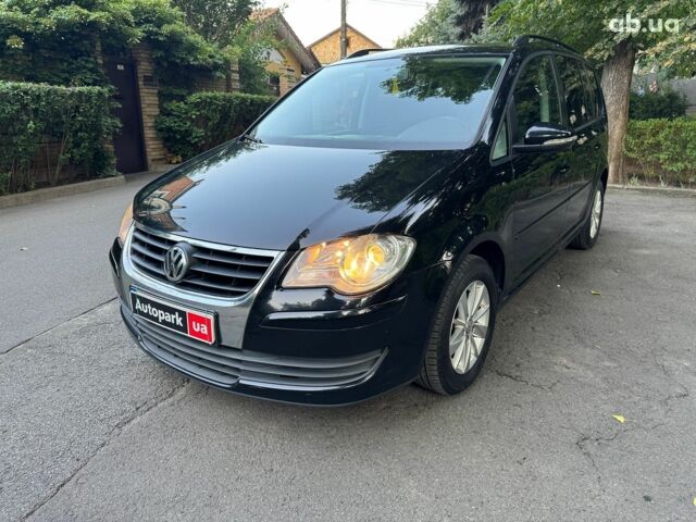 Чорний Фольксваген Туран, об'ємом двигуна 1.4 л та пробігом 260 тис. км за 7790 $, фото 1 на Automoto.ua