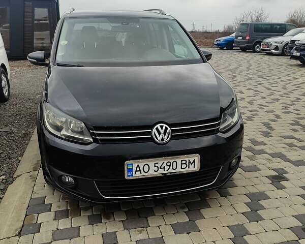 Черный Фольксваген Туран, объемом двигателя 2 л и пробегом 325 тыс. км за 9500 $, фото 1 на Automoto.ua