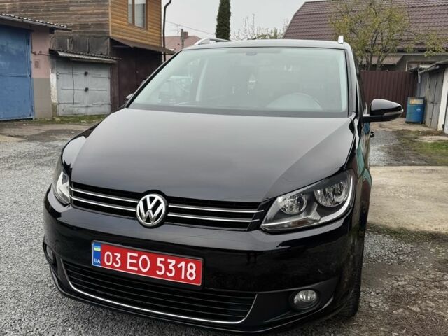 Черный Фольксваген Туран, объемом двигателя 2 л и пробегом 170 тыс. км за 13750 $, фото 1 на Automoto.ua