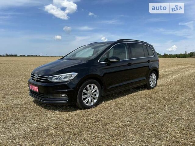 Черный Фольксваген Туран, объемом двигателя 2 л и пробегом 180 тыс. км за 22200 $, фото 1 на Automoto.ua