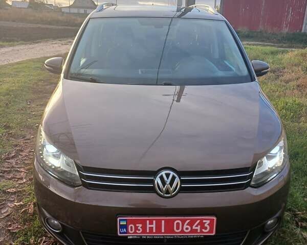 Коричневый Фольксваген Туран, объемом двигателя 1.4 л и пробегом 216 тыс. км за 9700 $, фото 1 на Automoto.ua
