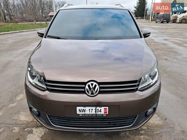 Коричневый Фольксваген Туран, объемом двигателя 2 л и пробегом 208 тыс. км за 13600 $, фото 1 на Automoto.ua