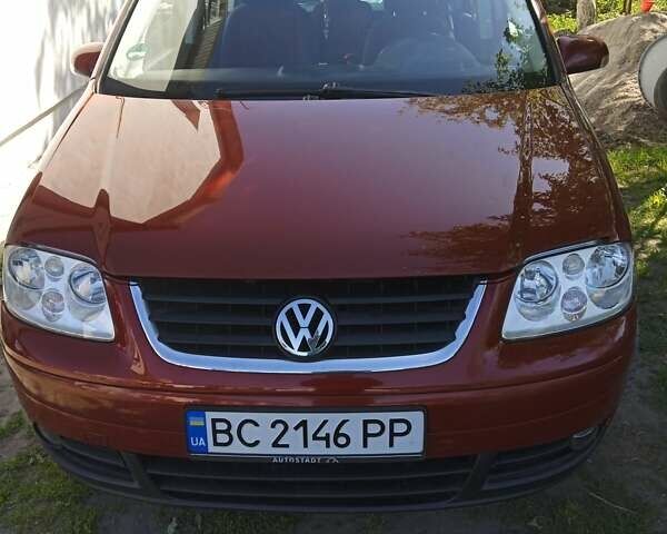 Красный Фольксваген Туран, объемом двигателя 1.6 л и пробегом 22 тыс. км за 5600 $, фото 1 на Automoto.ua