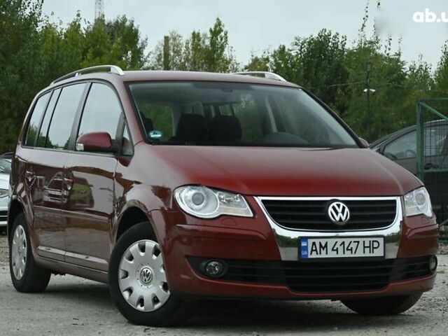 Красный Фольксваген Туран, объемом двигателя 1.4 л и пробегом 193 тыс. км за 6500 $, фото 1 на Automoto.ua