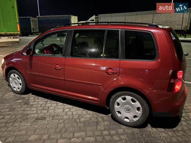 Червоний Фольксваген Туран, об'ємом двигуна 1.9 л та пробігом 314 тис. км за 7000 $, фото 1 на Automoto.ua