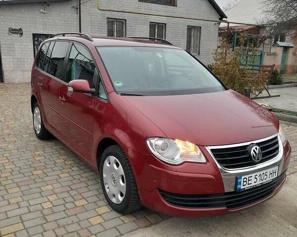 Червоний Фольксваген Туран, об'ємом двигуна 1.9 л та пробігом 315 тис. км за 6900 $, фото 1 на Automoto.ua