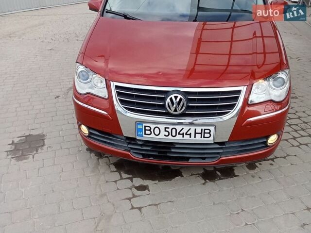 Червоний Фольксваген Туран, об'ємом двигуна 1.98 л та пробігом 235 тис. км за 8199 $, фото 1 на Automoto.ua