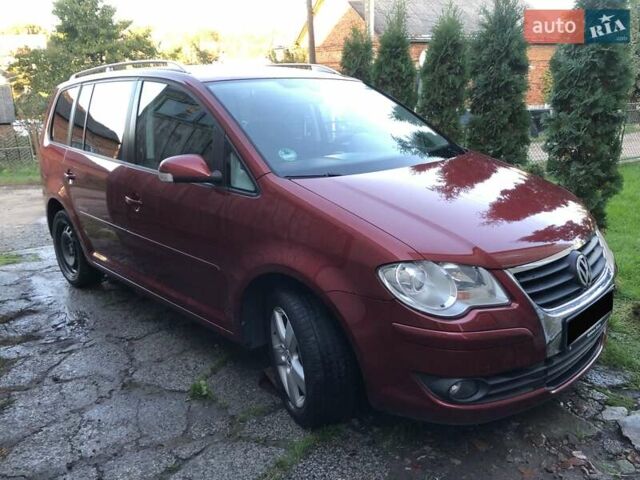 Червоний Фольксваген Туран, об'ємом двигуна 1.4 л та пробігом 241 тис. км за 7300 $, фото 1 на Automoto.ua