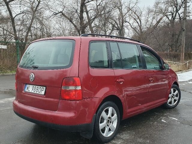 Червоний Фольксваген Туран, об'ємом двигуна 2 л та пробігом 333 тис. км за 2450 $, фото 1 на Automoto.ua