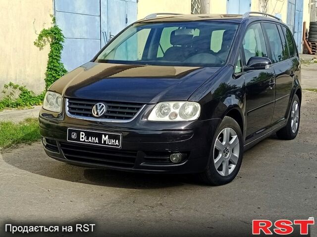 Фольксваген Туран, объемом двигателя 2 л и пробегом 289 тыс. км за 2950 $, фото 1 на Automoto.ua