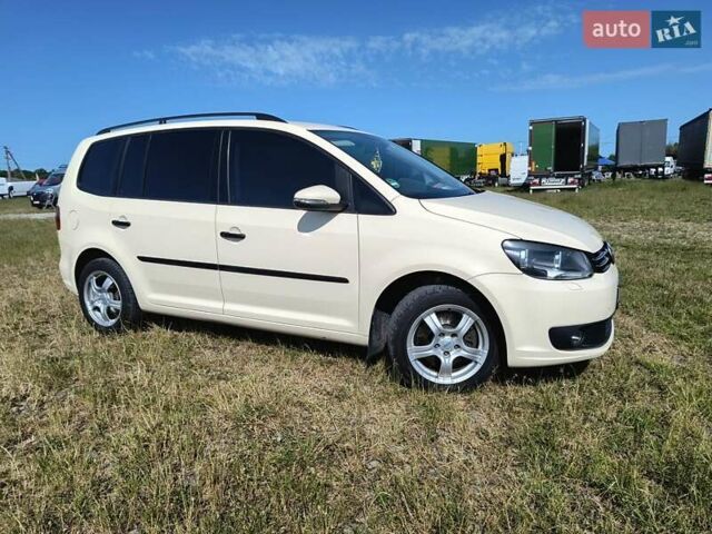 Желтый Фольксваген Туран, объемом двигателя 1.39 л и пробегом 340 тыс. км за 8300 $, фото 1 на Automoto.ua